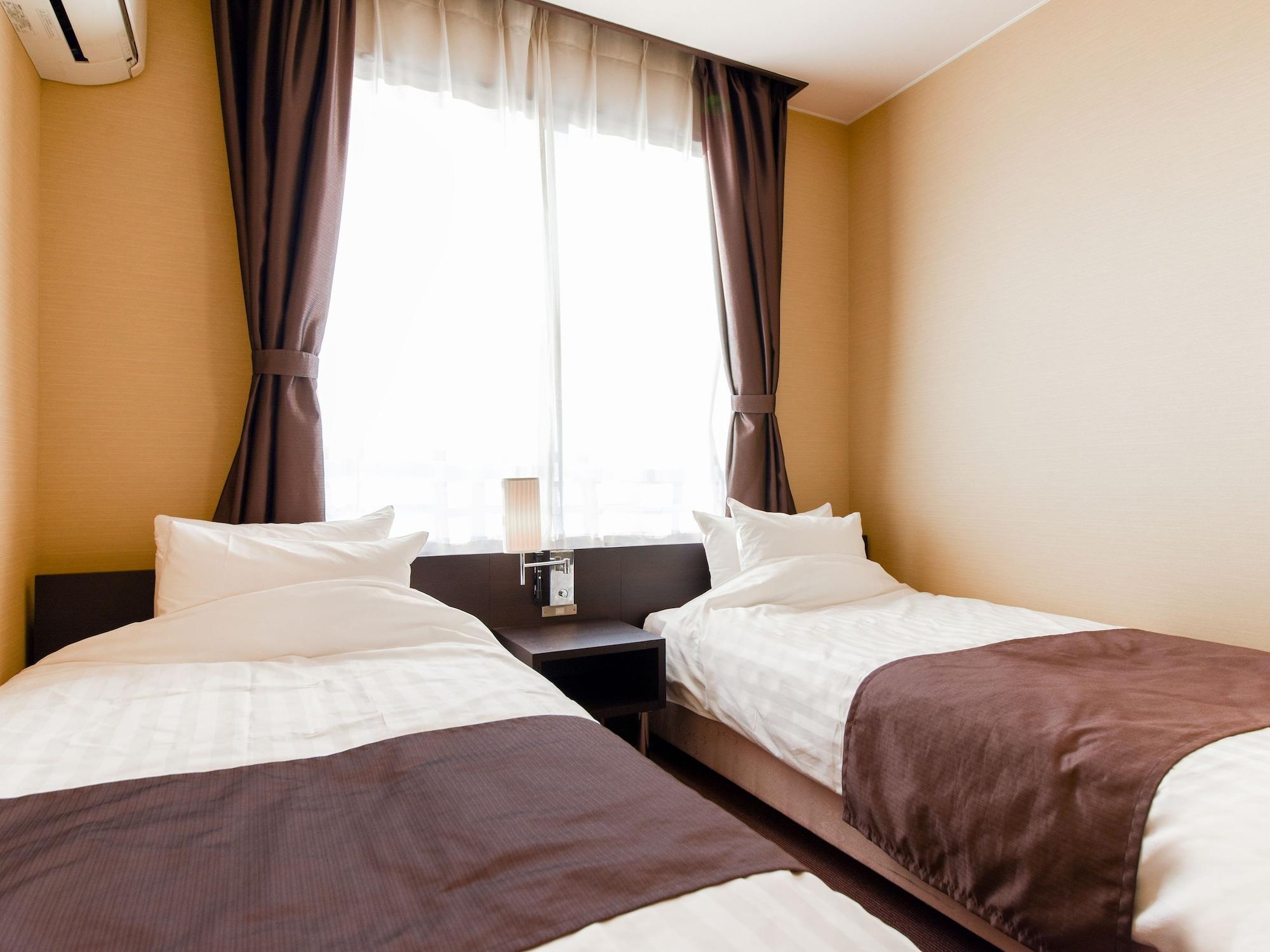 Tanegashima Araki Hotel Nishinoomote Bagian luar foto