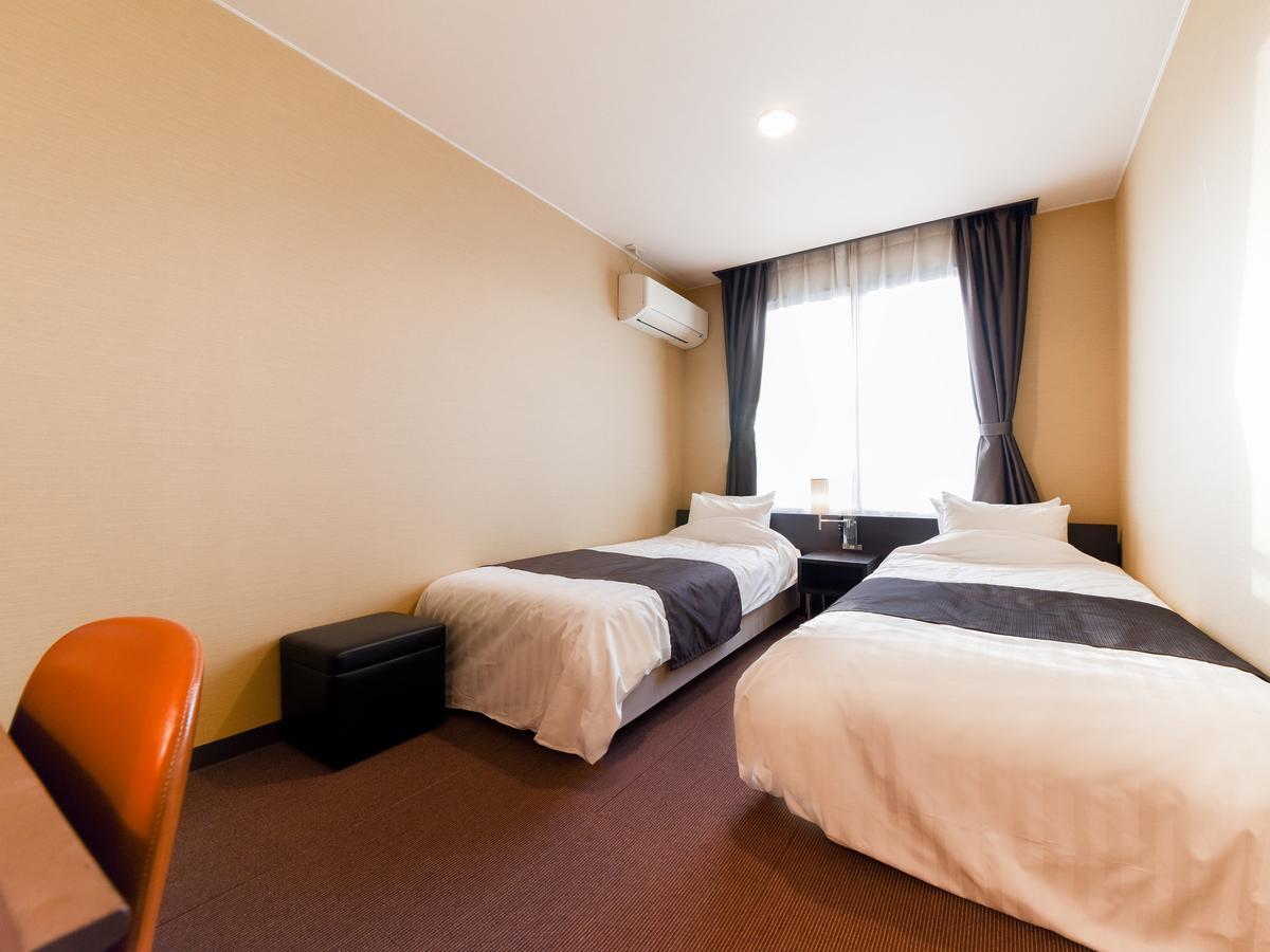 Tanegashima Araki Hotel Nishinoomote Bagian luar foto