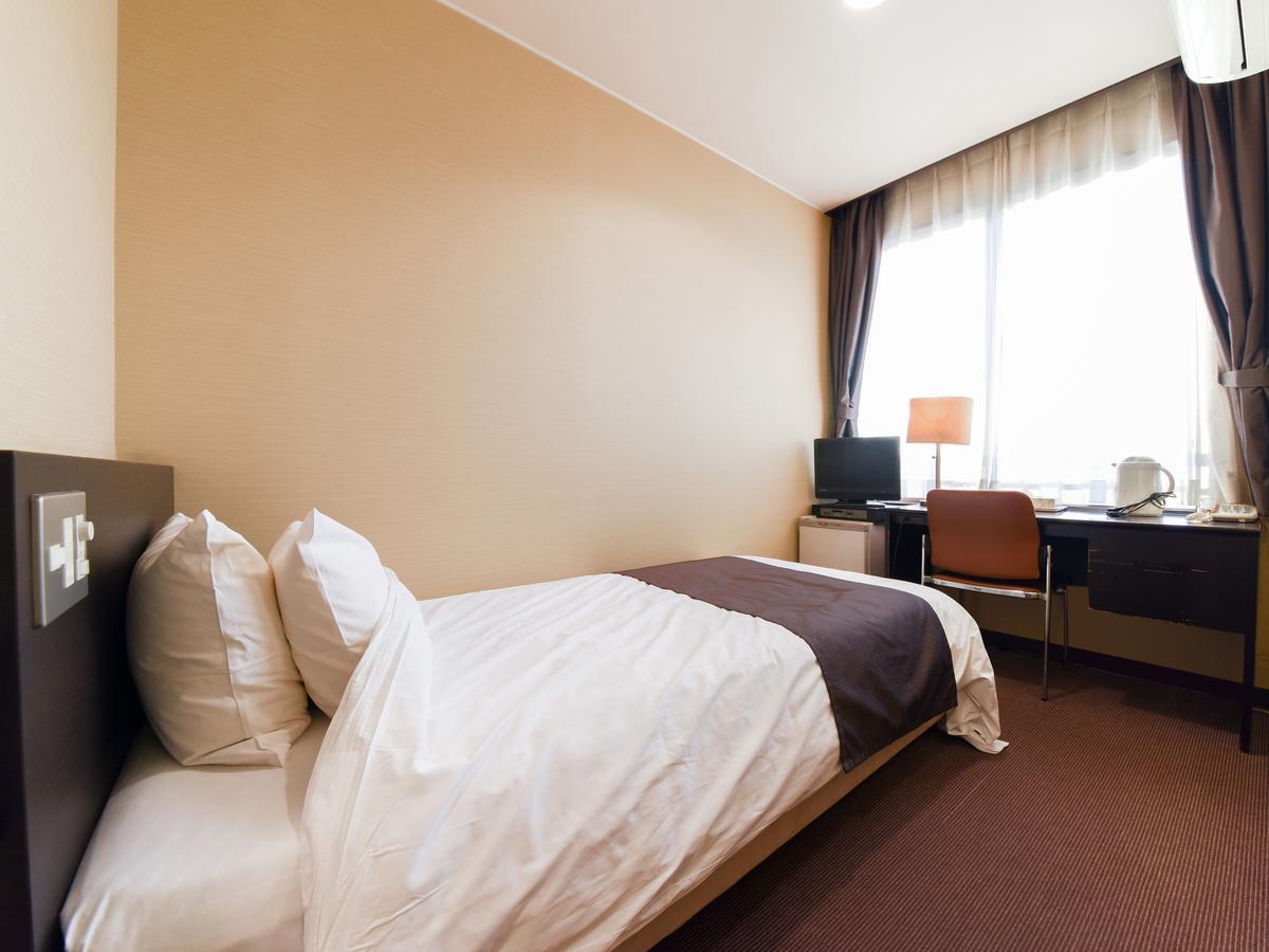 Tanegashima Araki Hotel Nishinoomote Bagian luar foto