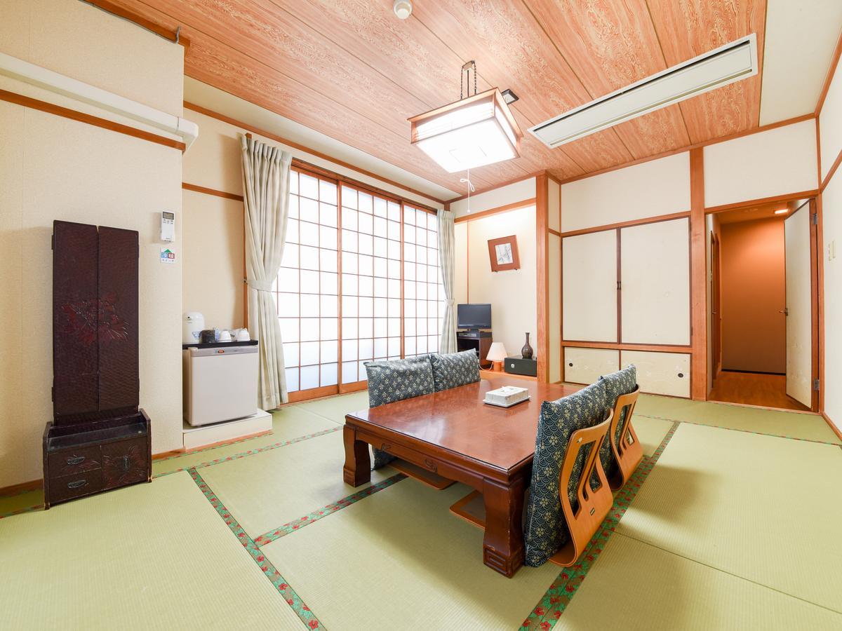 Tanegashima Araki Hotel Nishinoomote Bagian luar foto